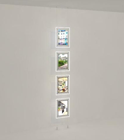 Schaufensterwerbung - Seilsystem mit doppelseitige LED Acryl - Postertaschen mit frontaler Befestigung DIN A4 - Digitale Werbedisplays - Modulare Displays® - München